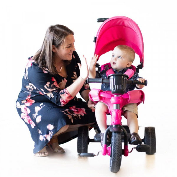 Triciclo para niños Joovy Tricycoo 4.1 con 4 etapas con neumático delantero extra ancho, manija para padres extraíble y ajustable, arnés de seguridad, almohadilla de asiento lavable a máquina y dosel retráctil (rosa)
